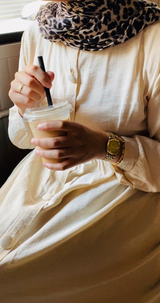 Creamy button-front flared dress.