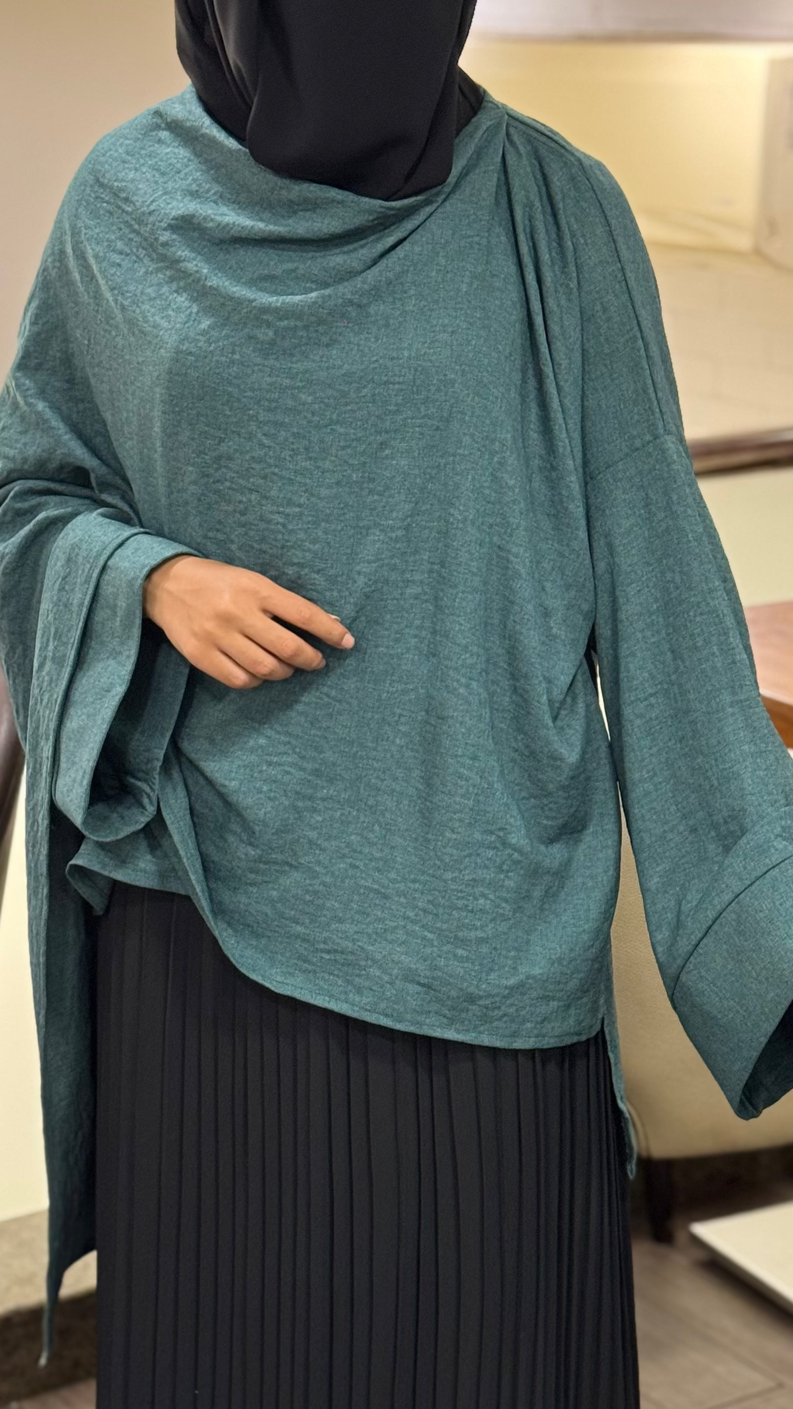 Olive blouse with a shoulder shawl